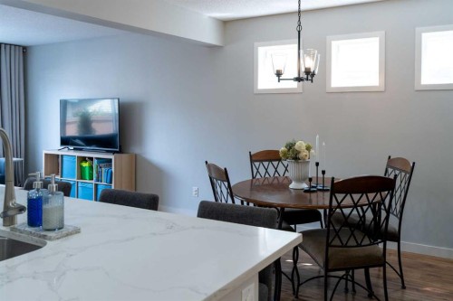 24 Copperpond Road Se, Calgary, AB - Indoor Photo Showing Dining Room