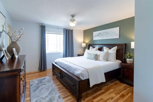 24 Copperpond Road Se, Calgary, AB - Indoor Photo Showing Bedroom