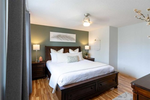 24 Copperpond Road Se, Calgary, AB - Indoor Photo Showing Bedroom