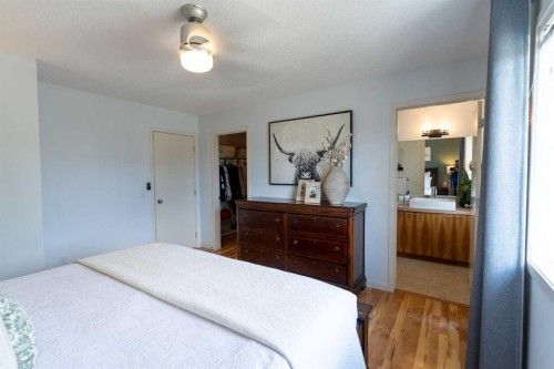 24 Copperpond Road Se, Calgary, AB - Indoor Photo Showing Bedroom