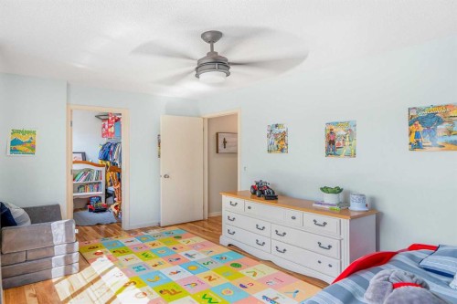 24 Copperpond Road Se, Calgary, AB - Indoor Photo Showing Bedroom