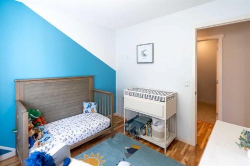 24 Copperpond Road Se, Calgary, AB - Indoor Photo Showing Bedroom