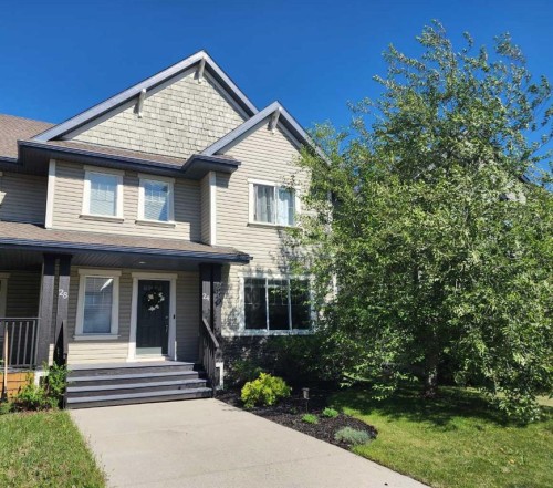 24 Copperpond Road Se, Calgary, AB - Outdoor With Deck Patio Veranda With Facade