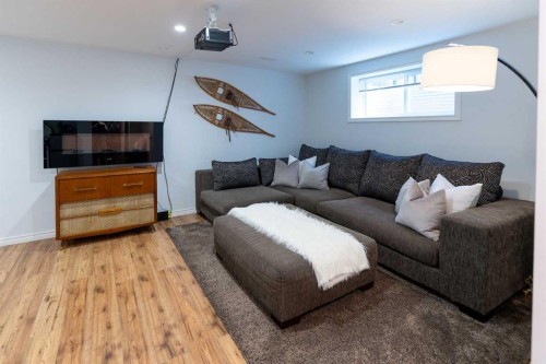 24 Copperpond Road Se, Calgary, AB - Indoor Photo Showing Living Room