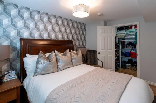 24 Copperpond Road Se, Calgary, AB - Indoor Photo Showing Bedroom