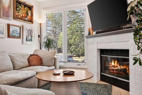 109 Coachway Lane Sw, Calgary, AB - Indoor Photo Showing Living Room