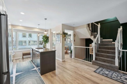 109 Coachway Lane Sw, Calgary, AB - Indoor Photo Showing Kitchen With Stainless Steel Kitchen With Upgraded Kitchen
