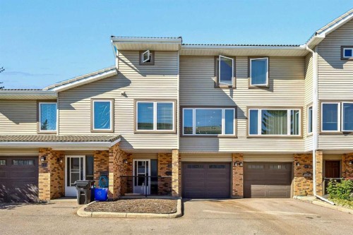 109 Coachway Lane Sw, Calgary, AB - Indoor Photo Showing Kitchen With Stainless Steel Kitchen With Upgraded Kitchen