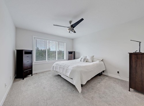 548 Cranbrook Gardens Se, Calgary, AB - Indoor Photo Showing Bedroom