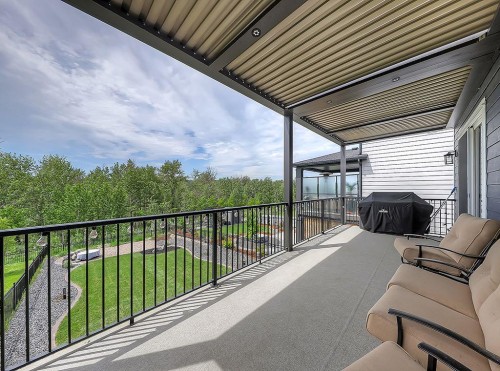 548 Cranbrook Gardens Se, Calgary, AB - Outdoor With Balcony With Deck Patio Veranda With Exterior