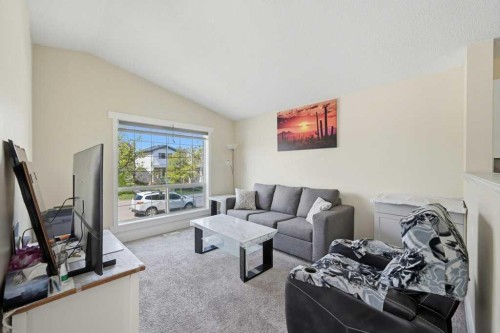 141 Martin Crossing Crescent Ne, Calgary, AB - Indoor Photo Showing Living Room