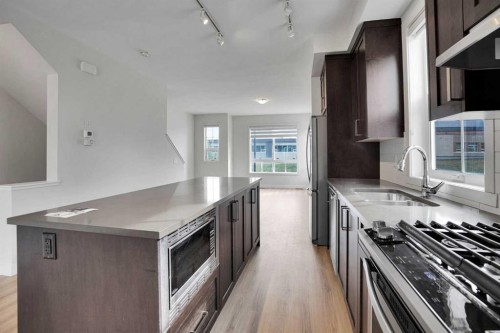 986 Sherwood Boulevard Nw, Calgary, AB - Indoor Photo Showing Kitchen With Upgraded Kitchen