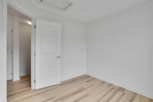 986 Sherwood Boulevard Nw, Calgary, AB - Indoor Photo Showing Other Room