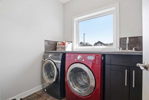 135 Cranleigh View Se, Calgary, AB - Indoor Photo Showing Laundry Room