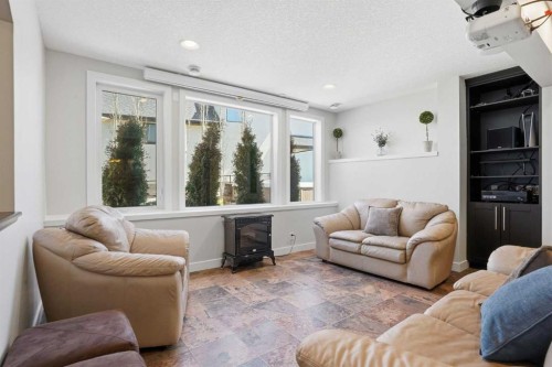 135 Cranleigh View Se, Calgary, AB - Indoor Photo Showing Living Room