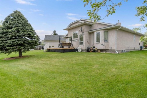 310 Riverside Garden Nw, High River, AB - Outdoor With Deck Patio Veranda With Exterior