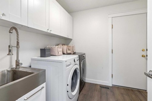 147 Hamptons Heath Nw, Calgary, AB - Indoor Photo Showing Laundry Room