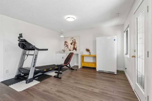 147 Hamptons Heath Nw, Calgary, AB - Indoor Photo Showing Gym Room
