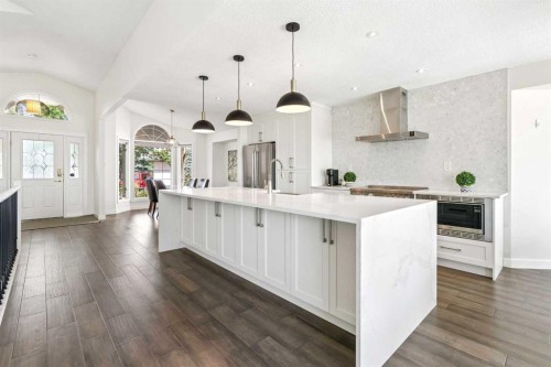147 Hamptons Heath Nw, Calgary, AB - Indoor Photo Showing Kitchen With Upgraded Kitchen