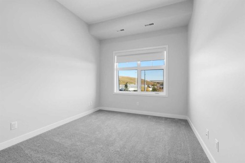 406-255 Les Jardins Park Se, Calgary, AB - Indoor Photo Showing Other Room