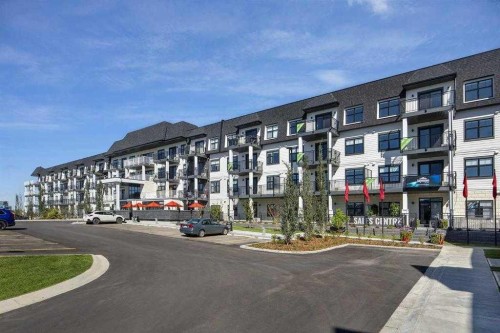 406-255 Les Jardins Park Se, Calgary, AB - Outdoor With Balcony With Facade