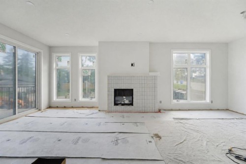 4612 Grove Hill Road Sw, Calgary, AB - Indoor With Fireplace