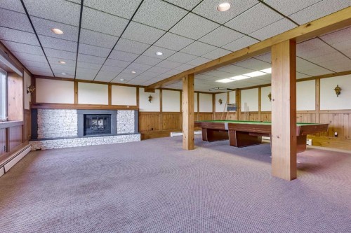 273167 Range Road 25, Rural Rocky View County, AB - Indoor With Fireplace