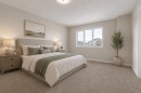 51 Saddlebred Place, Cochrane, AB  - Indoor Photo Showing Bedroom 
