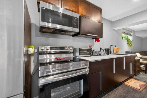 76 Rainbow Falls Boulevard, Chestermere, AB - Indoor Photo Showing Kitchen