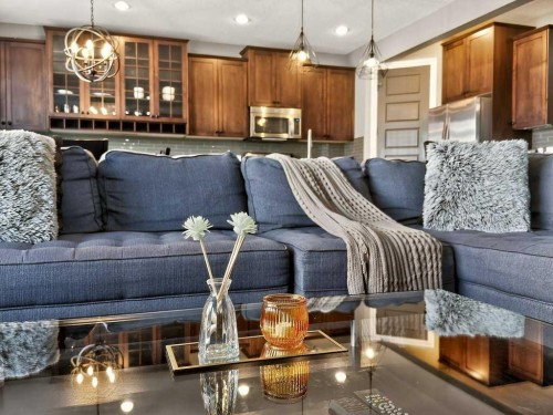 76 Rainbow Falls Boulevard, Chestermere, AB - Indoor Photo Showing Living Room