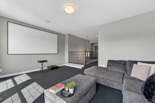 76 Rainbow Falls Boulevard, Chestermere, AB - Indoor Photo Showing Living Room
