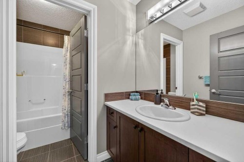 76 Rainbow Falls Boulevard, Chestermere, AB - Indoor Photo Showing Bathroom