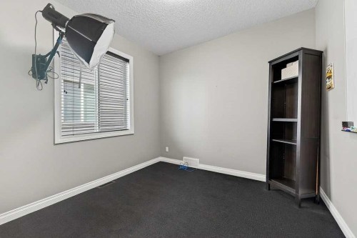 76 Rainbow Falls Boulevard, Chestermere, AB - Indoor Photo Showing Other Room