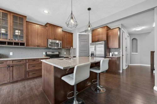 76 Rainbow Falls Boulevard, Chestermere, AB - Indoor Photo Showing Kitchen