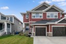 390 River Heights Crescent, Cochrane, AB  - Outdoor With Facade 