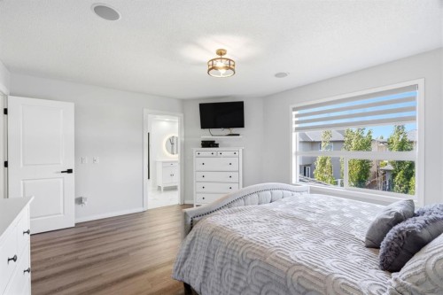 212 Willowmere Close, Chestermere, AB - Indoor Photo Showing Bedroom