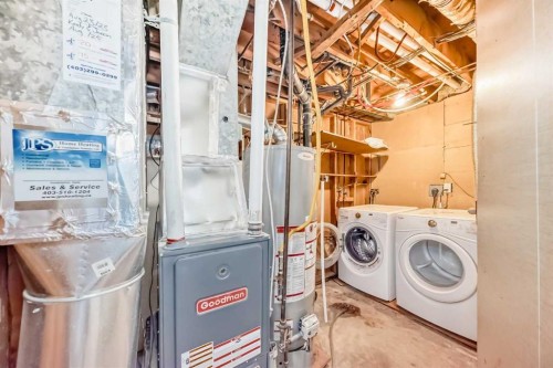 703 58 Street Se, Calgary, AB - Indoor Photo Showing Laundry Room