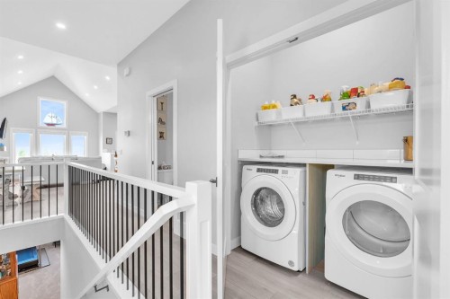 1098 Creekside Boulevard Sw, Calgary, AB - Indoor Photo Showing Laundry Room
