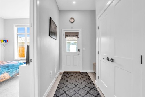 1098 Creekside Boulevard Sw, Calgary, AB - Indoor Photo Showing Other Room