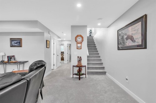 1098 Creekside Boulevard Sw, Calgary, AB - Indoor Photo Showing Other Room