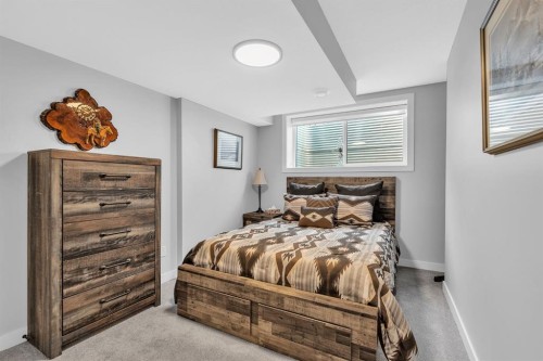 1098 Creekside Boulevard Sw, Calgary, AB - Indoor Photo Showing Bedroom
