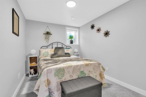 1098 Creekside Boulevard Sw, Calgary, AB - Indoor Photo Showing Bedroom