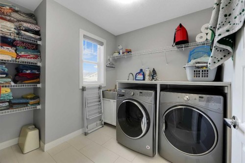 98 Red Sky Green Ne, Calgary, AB - Indoor Photo Showing Laundry Room