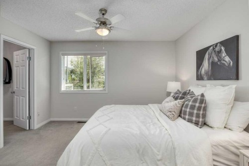 31-8 Riverview Circle, Cochrane, AB - Indoor Photo Showing Bedroom
