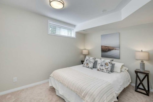31-8 Riverview Circle, Cochrane, AB - Indoor Photo Showing Bedroom