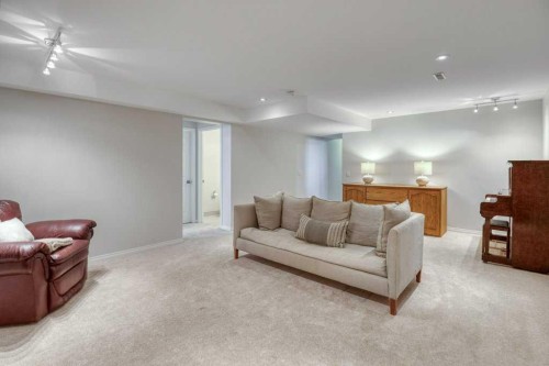 31-8 Riverview Circle, Cochrane, AB - Indoor Photo Showing Living Room