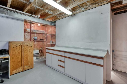 31-8 Riverview Circle, Cochrane, AB - Indoor Photo Showing Basement