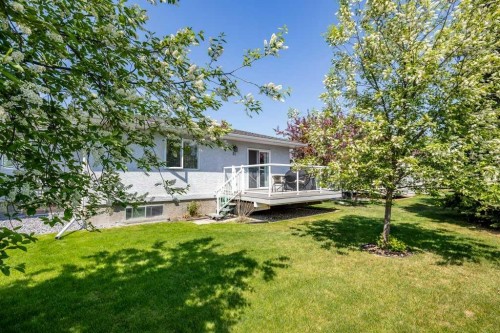 31-8 Riverview Circle, Cochrane, AB - Outdoor With Deck Patio Veranda