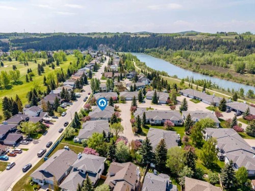 31-8 Riverview Circle, Cochrane, AB - Outdoor With Body Of Water With View
