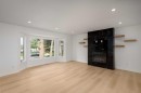 312 Queensland Road Se, Calgary, AB  - Indoor Photo Showing Living Room 